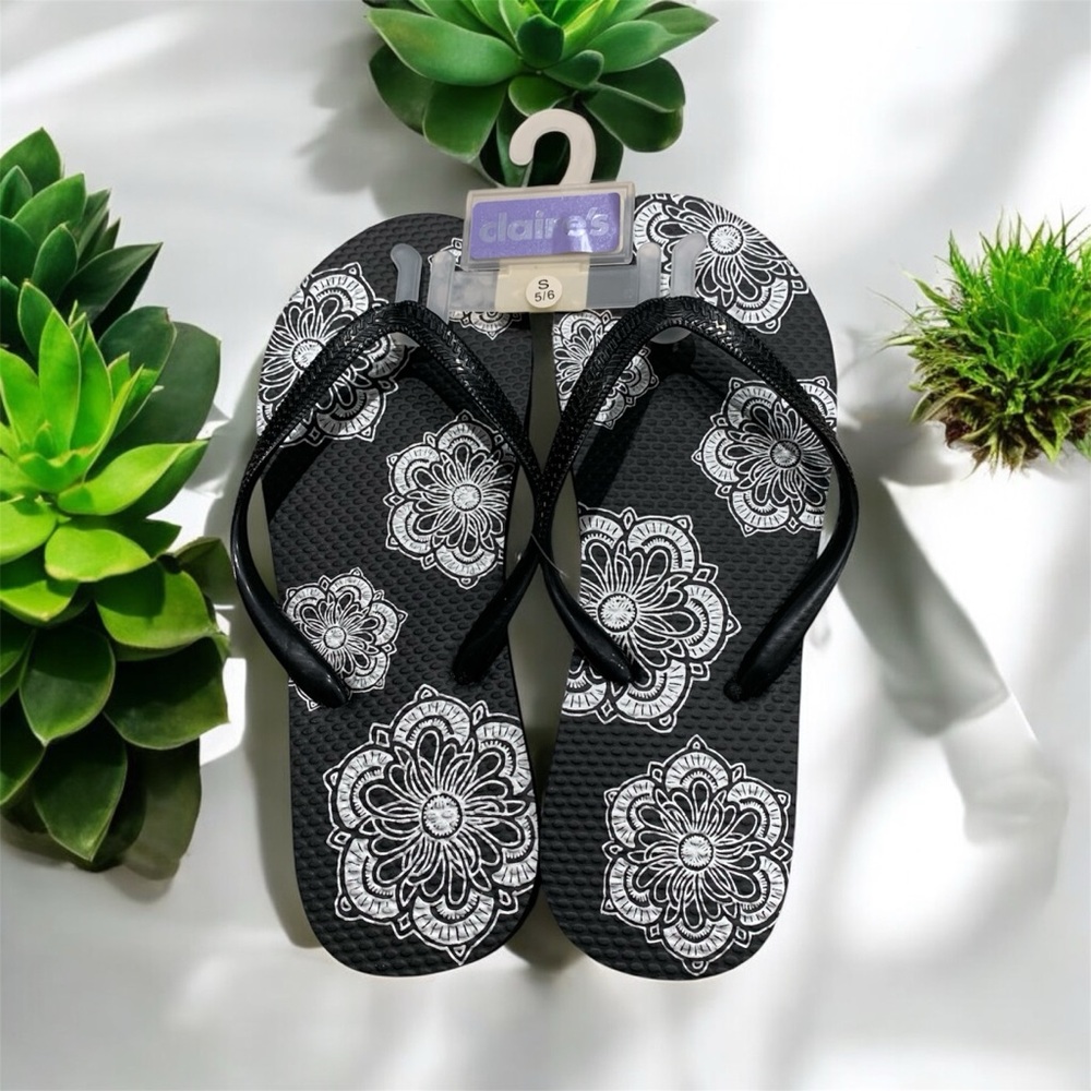 Claire's Black Flip Flops with White Mandala Design